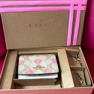 Mini coach shoulder bag with hearts like new